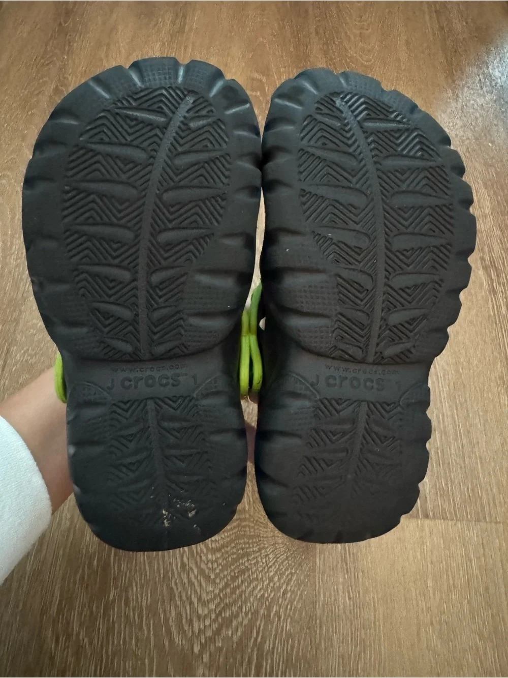 CROCS Kids Black Clogs with Lime Green Heel Strap